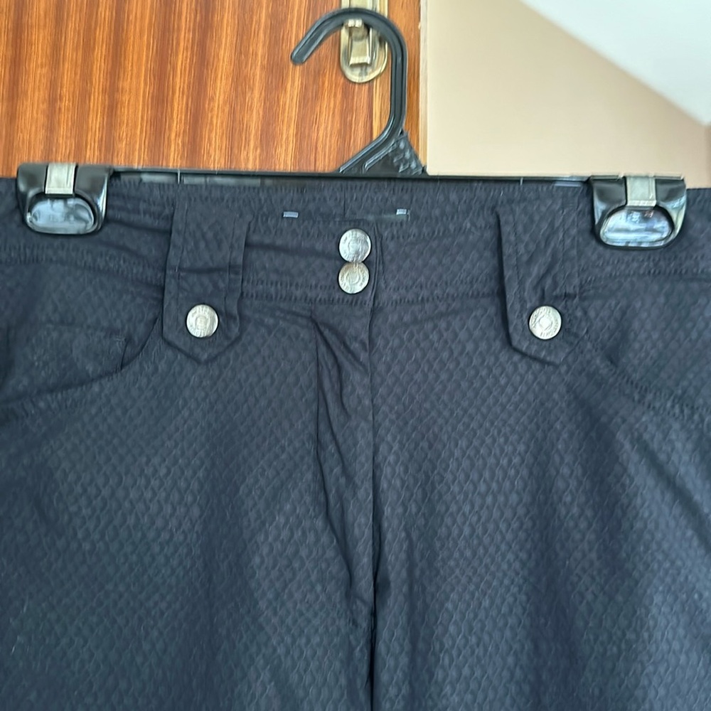 Luxury travel pants in embossed black